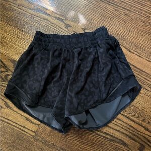 Gently used Lululemon Hotty Hot Black print shorts size 4 Tall Shorts
